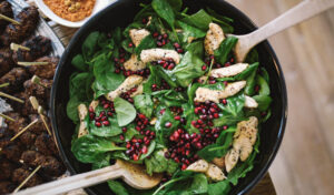 healthy spinach salad with promegranates